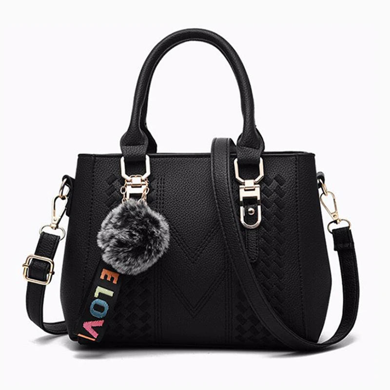 Luxe Leather Handbag with Embroidery & Pom Charm