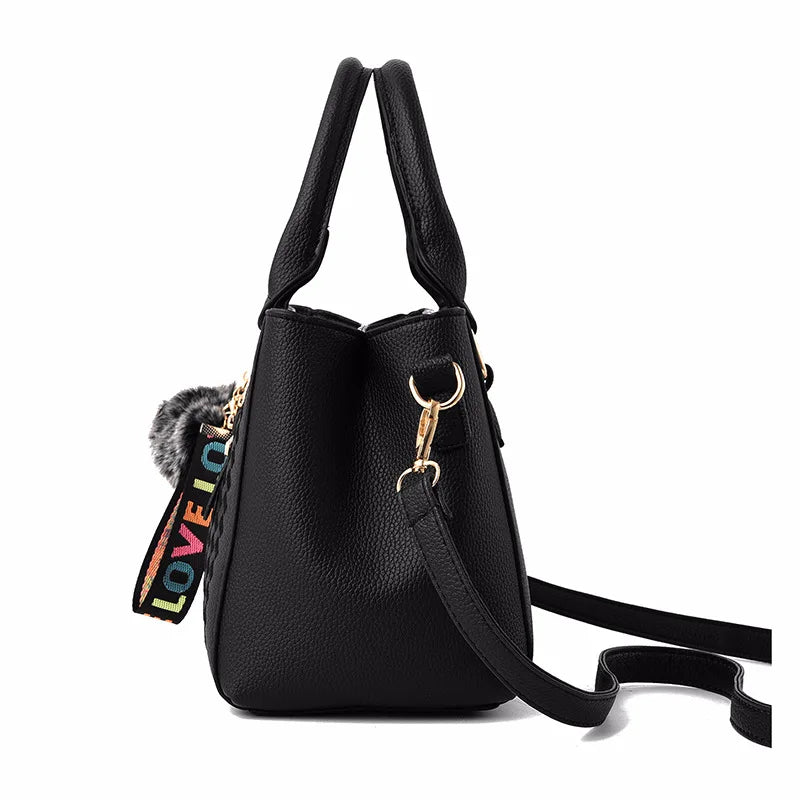 Luxe Leather Handbag with Embroidery & Pom Charm