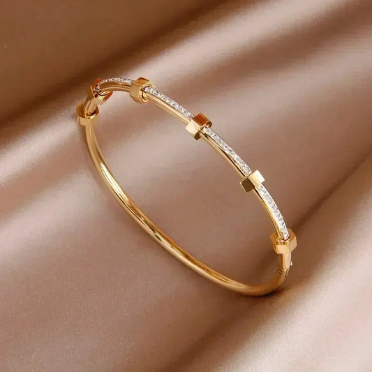 Timeless Round Cubic Zirconia Bangle: Elegance in Gold & Silver