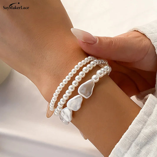 Layered Pearl Necklace & Bracelet Set: Elegant Heart Accents for Women