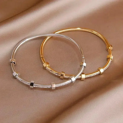 Timeless Round Cubic Zirconia Bangle: Elegance in Gold & Silver